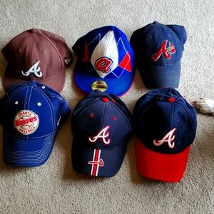 Collection of 6 Atlanta Braves Baseball caps. Some like New,some well-worn